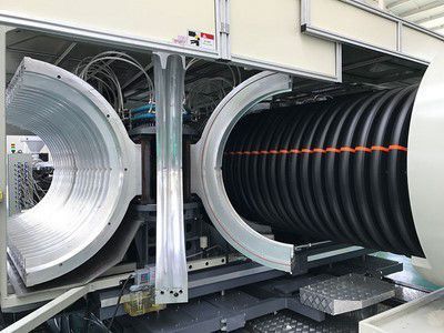 Large-diameter corrugated pipe production